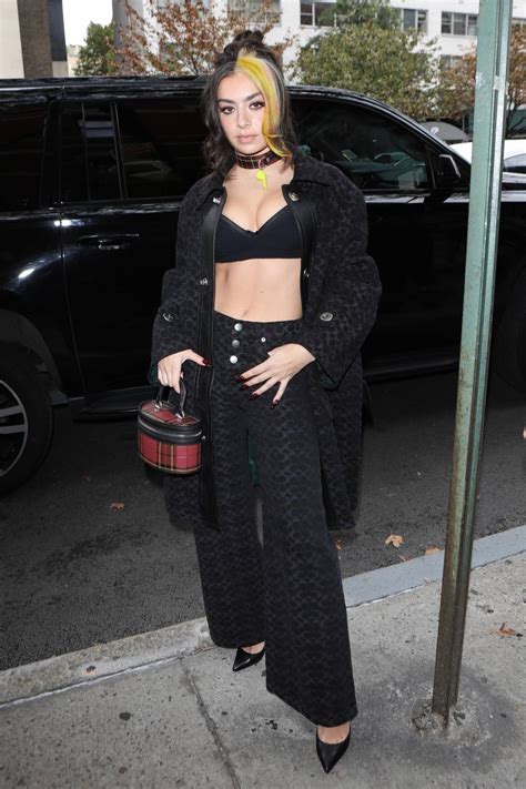 Charli Xcx Dons A Coach Ensemble Outside Fashion Week Event In New