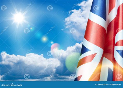 National Flags Of United Kingdom On A Flagpole On Blue Sky Background