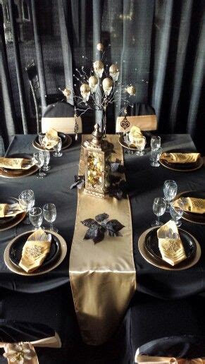 Black and gold party table decorations. Black and Gold | New years eve decorations, New years eve party, Party table decorations