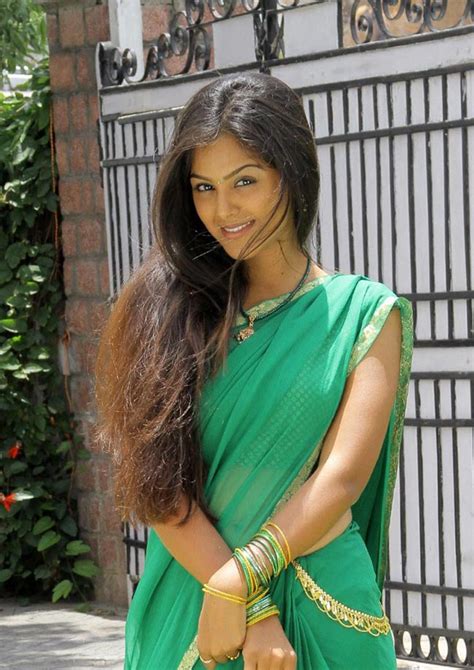 Actresses Monal Gajjar Hot Stills In Green Saree From Her Latest Telugu Movie Latest Portfolio