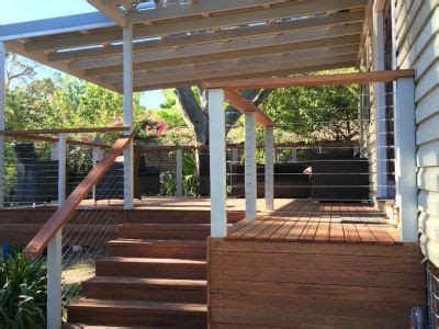 Handrails for stairs with one side against a wall: We constructed this deck at Wallsend from merbau decking ...