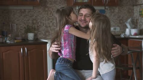 Daughter Firmly Embracing Beloved Dad Slow Motion Stock Video Footage