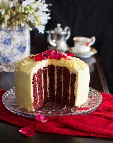 To qualify as a red velvet cake, ingredients must include cocoa powder, buttermilk, white vinegar and baking soda. Vertical Layer Red Velvet Cake with Cream Cheese Icing ...