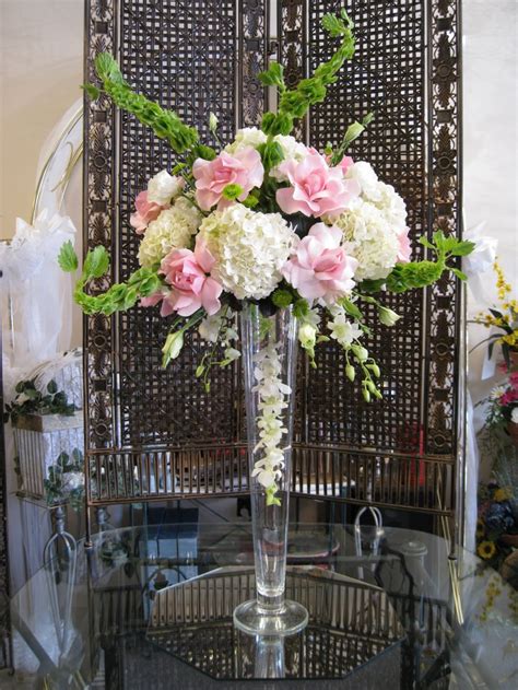 Pink White And Green Wedding Centerpiece With Roses