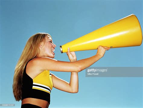 Cheerleader Yelling Through Megaphone Low Angle Side View Photo Getty