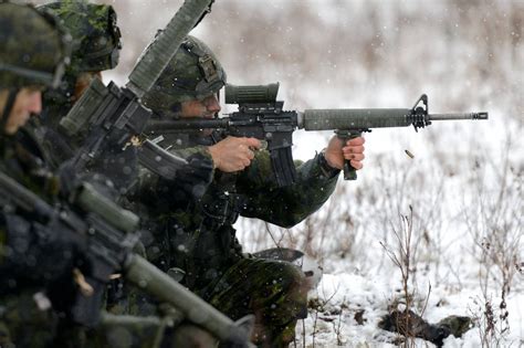 Canadian Army Soldiers From The Royal 22e Régiment Fire Their C7a2