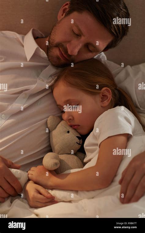 Father And Daughter Sleeping Bed Hi Res Stock Photography And Images