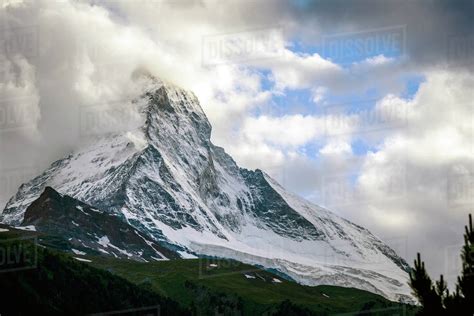 Matterhorn Mountain And Cloudy Sky Zermatt Switzerland Stock Photo