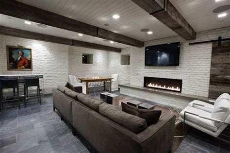 The beamed ceiling is an example. charcoal Painted Brick Fireplace | basement game room with ...