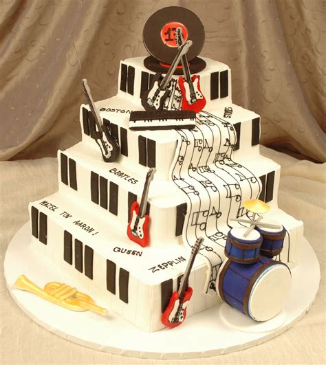 Four Layer Square Fondant Iced Cake With Hand Designed Musical