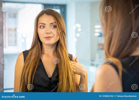 Beautiful Young Woman Looking In The Mirror Stock Photo Image Of
