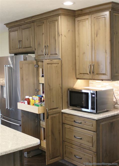 Spot treatments with wood stain can restore the looks of worn kitchen cabinets without a messy overhaul. finished end panel Archives - Village Home Stores Blog