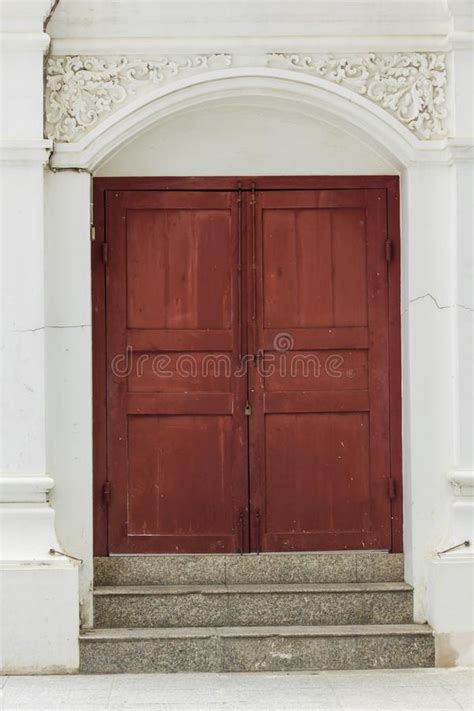 Old Brown Wood Doors On White Walls Are Closed Stock Image Image Of