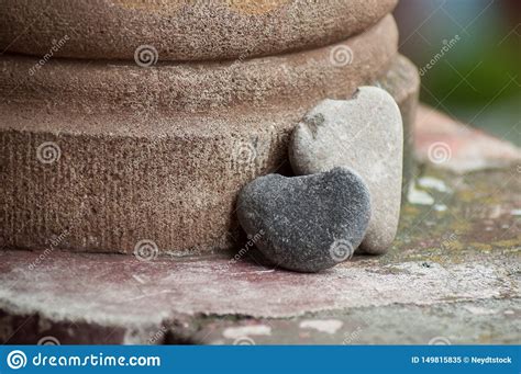 Stone In Shaped Heart On Stoned Wall In Outdoor Love Concept Stock