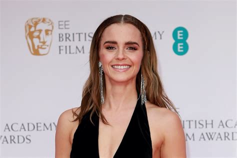 Emma Watson Takes The Red Carpet In Sinuous Beaded Pumps Plunging Tulle Dress At Baftas