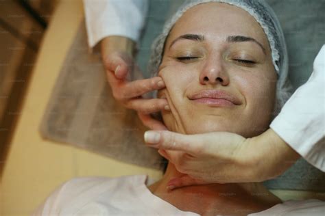 Woman Having Her Face Massaged Photo Side View Image On Unsplash