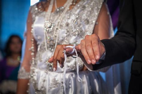 Bride And Groom Holding Hands During The Indian Wedding Ceremony Stock