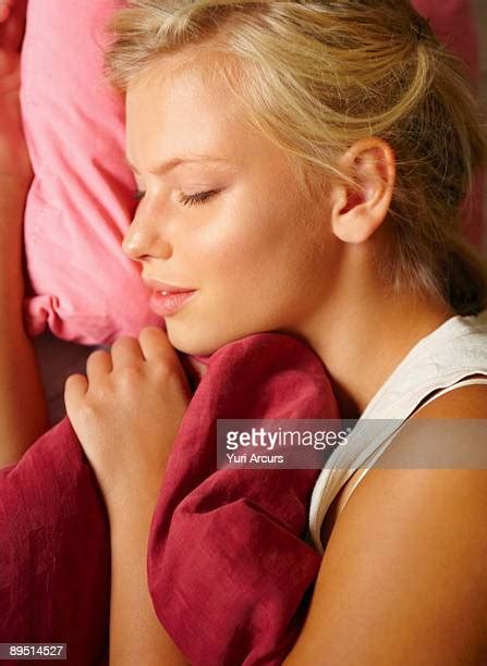 Blonde Girl Sleeping Above View Photos And Premium High Res Pictures