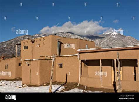 An Old Adobe Home At The Ancient Native American Taos Pueblo Outside