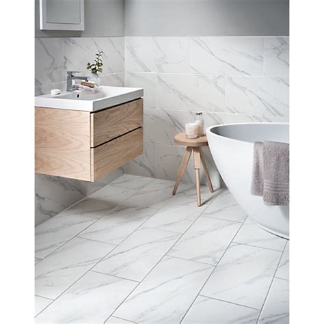 What type of porcelain should i use if i want it in a bathroom and shower? Wickes Calacatta Matt White Glazed Marble Effect Porcelain ...
