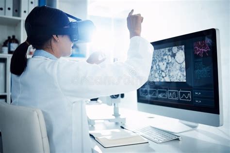 taking science straight into the future a scientist using a virtual reality headset while