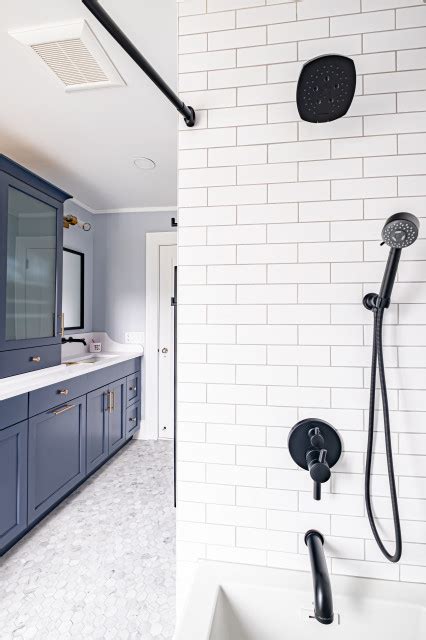 white subway tile shower with black fixtures minimalistisch badezimmer newark von
