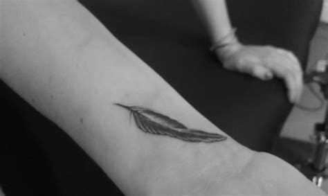 57 Attractive Wrist Feather Tattoos