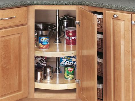 Pullout shelf in kitchen cabinets with storage room for cooking utensils like spatulas. View Kitchen Pantry Cabinet Lowes Canada Pics