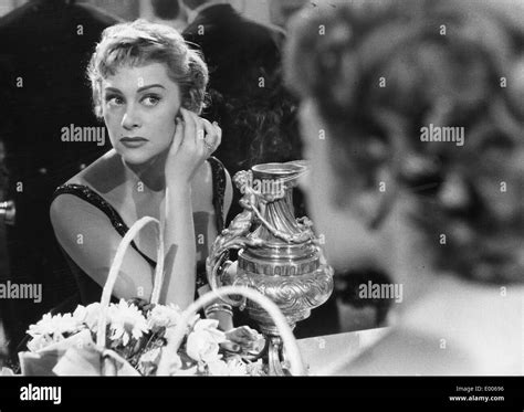 The French Actress Martine Carol In Front Of A Mirror Hi Res Stock