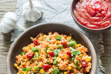 Premium Photo Bowl Of Mexican Rice With Tomato Sauce