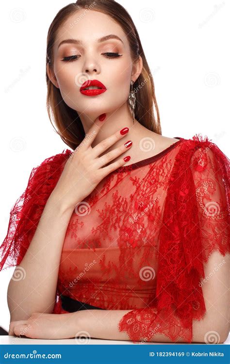 Beautiful Girl In Red Dress With Classic Make Up And Red Manicure Beauty Face Stock Image