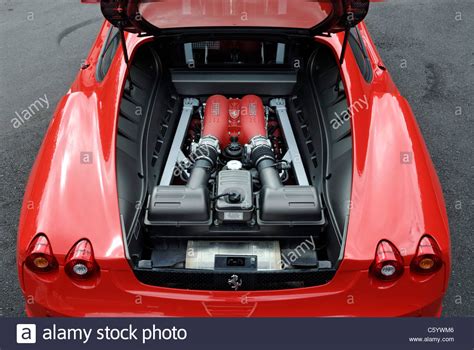 Ferrari's first homegrown engine was a v12 though, and he. engine bay of a red Ferrari F430 sports car Stock Photo ...
