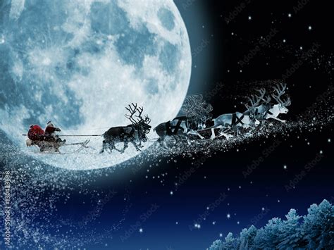 santa claus get a move to ride on their reindeer magic santa s sleigh flying over christmas