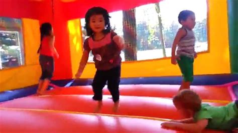 Kids Play In Inflatable Bounce House Youtube