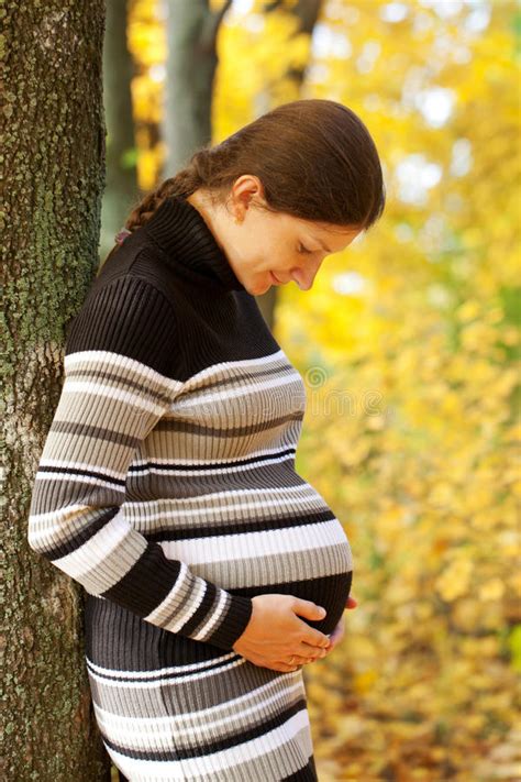 Pregnant Woman Playing A Pipe Stock Image Image Of Dress Romance