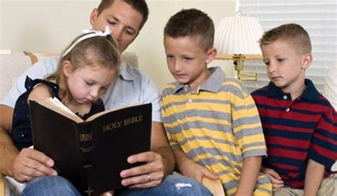 A Father Reads From The Bible With His Children Credit Deseret News