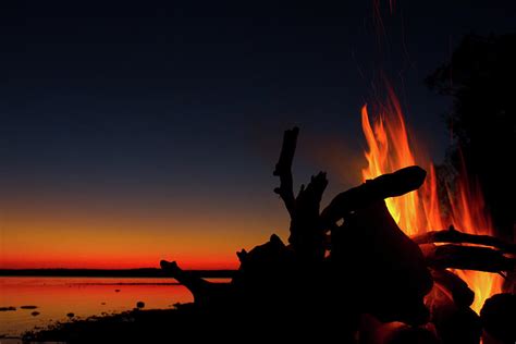 Campfire At Sunset Photograph By Roxy Sheckells Fine Art America
