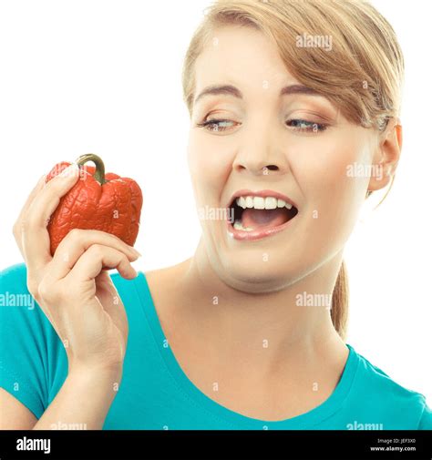Unhappy And Disgusted Woman Holding In Hand Old Wrinkled Peppers Concept Of Unhealthy Food