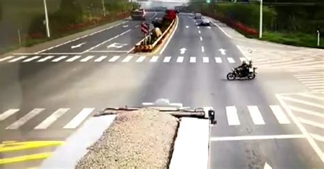 Motorcyclists Trapped After Truck Dumps Tonnes Of Rubble On Them In