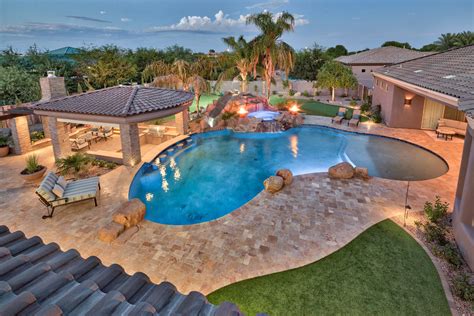 When landscaping around a pool, it's important to consider the pool design — its style and shape. Beautiful Mesa, Arizona Backyard - Mediterranean - Pool ...