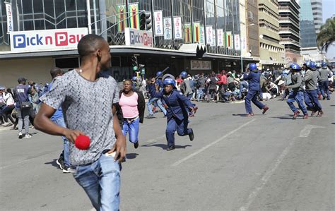 Zimbabwes Police Beat Anti Government Protesters In Capital