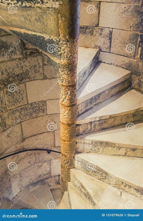 A Spiral Stone Staircase In A Narrow High Tower Stock Photo Image Of