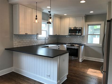 Steel grey granite, imported from india, is the best choice. The Finished Flip | White shaker kitchen, Kitchen remodel ...
