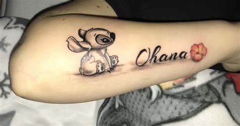 A Person With A Tattoo On Their Arm That Says Chana And An Elephant