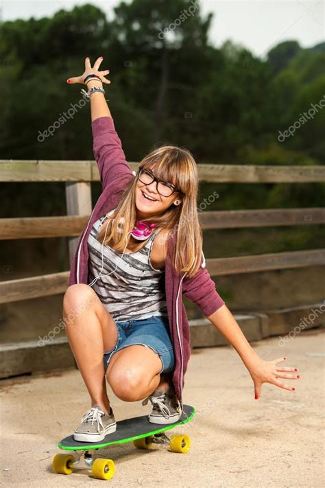Cute Teenage Girl Skateboarding Stock Photo By ©karelnoppe 13137575
