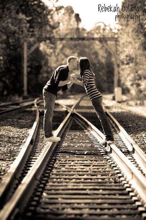 Couple Kissing On Train Tracks Rebekah Goldman Photography Train Tracks Photography