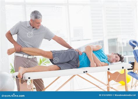 Doctor Examining His Patient Leg Stock Image Image Of Examination