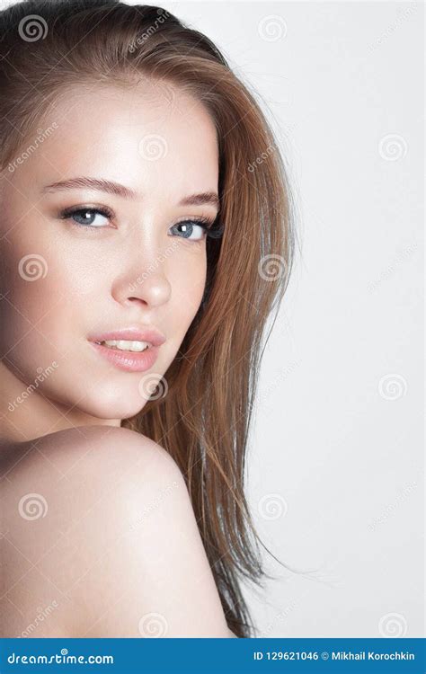 Young Beautiful Girl With Clean Perfect Skin Close Up Stock Photo
