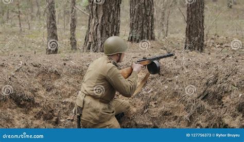 Russian Soviet Infantry Soldier Of World War Ii Reloading Sub Machine