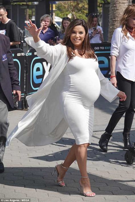 Eva Longoria Shows Off Pregnant Belly With Mario Lopez On Extra Daily